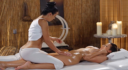 Exotic lesbian massage with a lot of oil